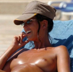 3. Alessia Merz – topless by the pool, 2005