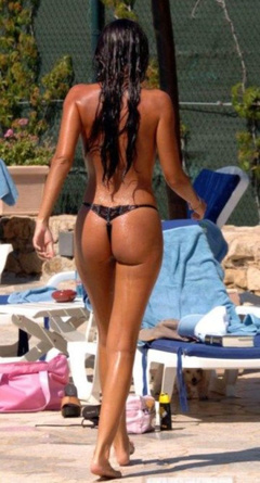 8. Alessia Merz – topless by the pool, 2005