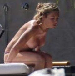 7. Abigail Clancy – Topless sunbathing, 2008