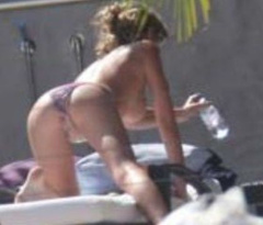 8. Abigail Clancy – Topless sunbathing, 2008