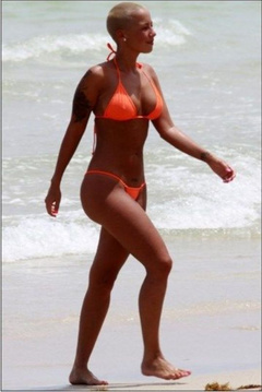 1. Amber Rose – topless at the beach, 2009