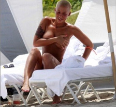 5. Amber Rose – topless at the beach, 2009