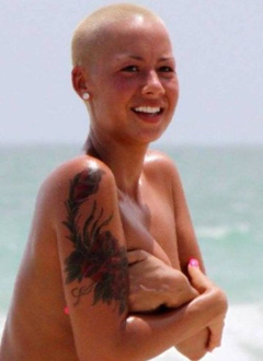 10. Amber Rose – topless at the beach, 2009