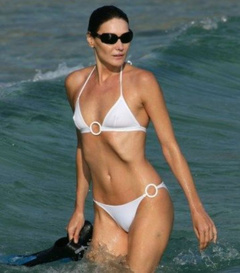 7. Carla Bruni – white bikini, 2008