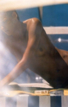 5. Carmen Kass – Topless sunbathing, 2004