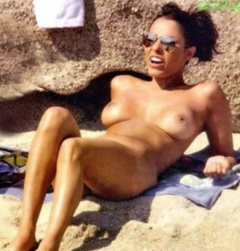 4. Carolina Marconi – Topless sunbathing, 2004