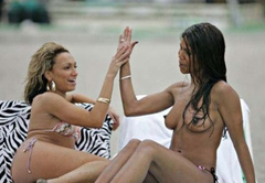 2. Charley Uchea – Topless sunbathing, 2008