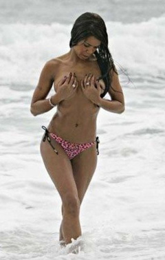 3. Charley Uchea – Topless sunbathing, 2008