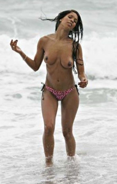 11. Charley Uchea – Topless sunbathing, 2008