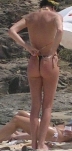 1. Charlize Theron – Topless sunbathing, 2005
