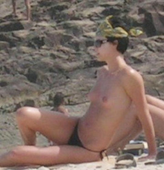 2. Charlize Theron – Topless sunbathing, 2005