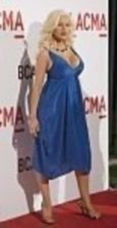 13. Christina Aguilera – Christina in sexy blue dress