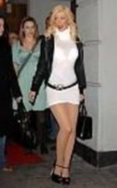2. Christina Aguilera Sexy – Sexy skimpy white skirt