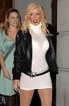 6. Christina Aguilera Sexy – Sexy skimpy white skirt
