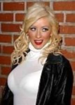 9. Christina Aguilera Sexy – Sexy skimpy white skirt