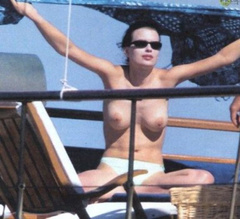 3. Claudia Pandolfi – Topless sunbathing, 2006