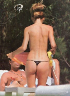 1. Daniela Urzi – Topless sunbathing, 2009