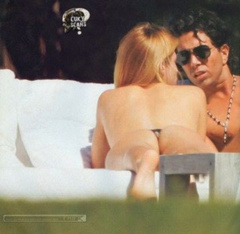 7. Daniela Urzi – Topless sunbathing, 2009