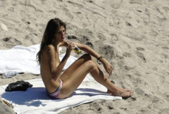 3. Erin Wasson – Topless sunbathing, 2010