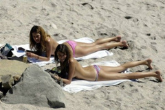 5. Erin Wasson – Topless sunbathing, 2010