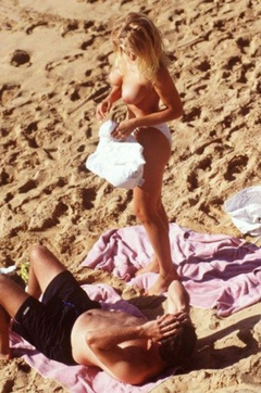 6. Gena Lee Nolin – Topless swimming, 1996