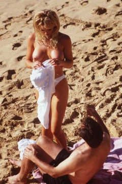 7. Gena Lee Nolin – Topless swimming, 1996