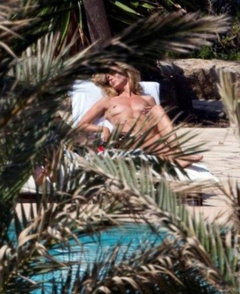 3. Heidi Klum – Topless sunbathing, 2011