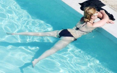 12. Heidi Range – bikini by the pool, 2008