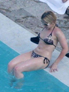 13. Heidi Range – bikini by the pool, 2008