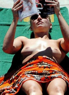 3. Holly Weston – topless sunbathing, 2013