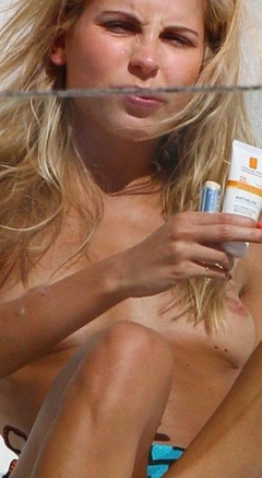 3. Jessica Hart – Topless sunbathing, 2012