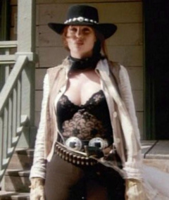 1. Kelly Lebrock Sexy – Hard Bounty, 1995