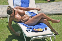 11. Kerry Katona – Topless sunbathing, 2011