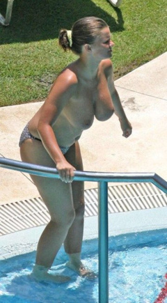 14. Kerry Katona – Topless sunbathing, 2011