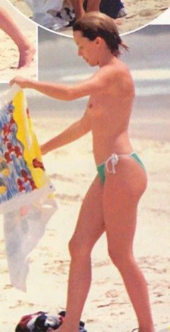 4. Kylie Minogue – topless at the beach