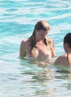 2. Lara Stone – Topless swimming, 2012