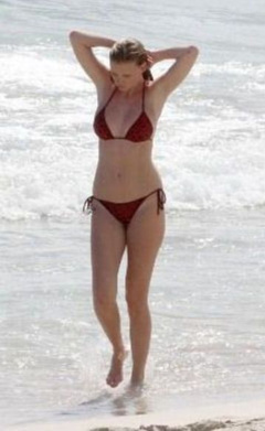 5. Lara Stone – Topless swimming, 2012