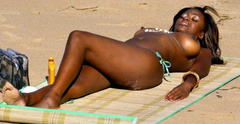 5. Makosi Musambasi – Topless sunbathing, 2005