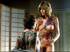 6. Maud Adams Naked – Tattoo, 1983