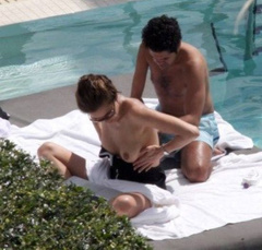 9. Melissa Theuriau – Topless sunbathing, 2009