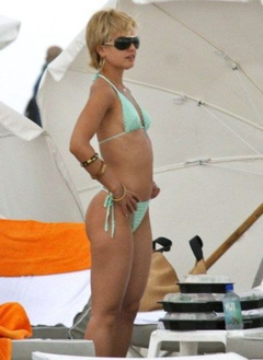7. Mena Suvari – green bikini, 2008