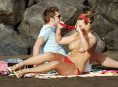 4. Michelle Bass – Topless sunbathing, 2006
