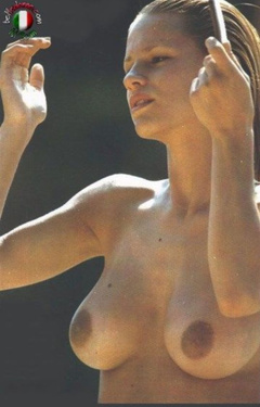 1. Michelle Hunziker – Topless sunbathing, 1999