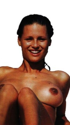 10. Michelle Hunziker – Topless sunbathing, 1999