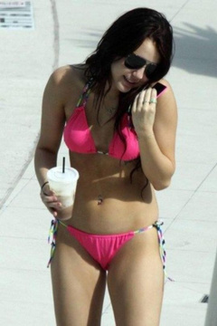 18. Miley Cyrus – pink bikini, 2009