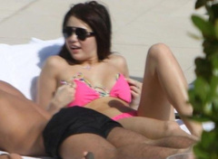 3. Miley Cyrus – pink bikini, 2009