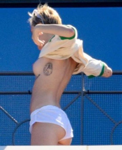 4. Miley Cyrus – topless, 2014