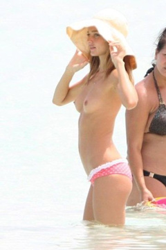 14. Miranda Kerr – topless at the beach, 2009