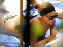 8. Miranda Kerr – topless on a balcony, 2008