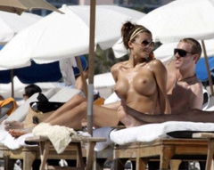 3. Oksana Andersson – Topless sunbathing, 2008